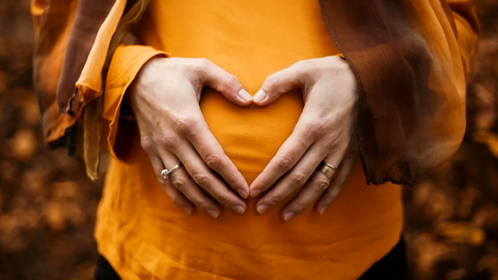 person touching stomach