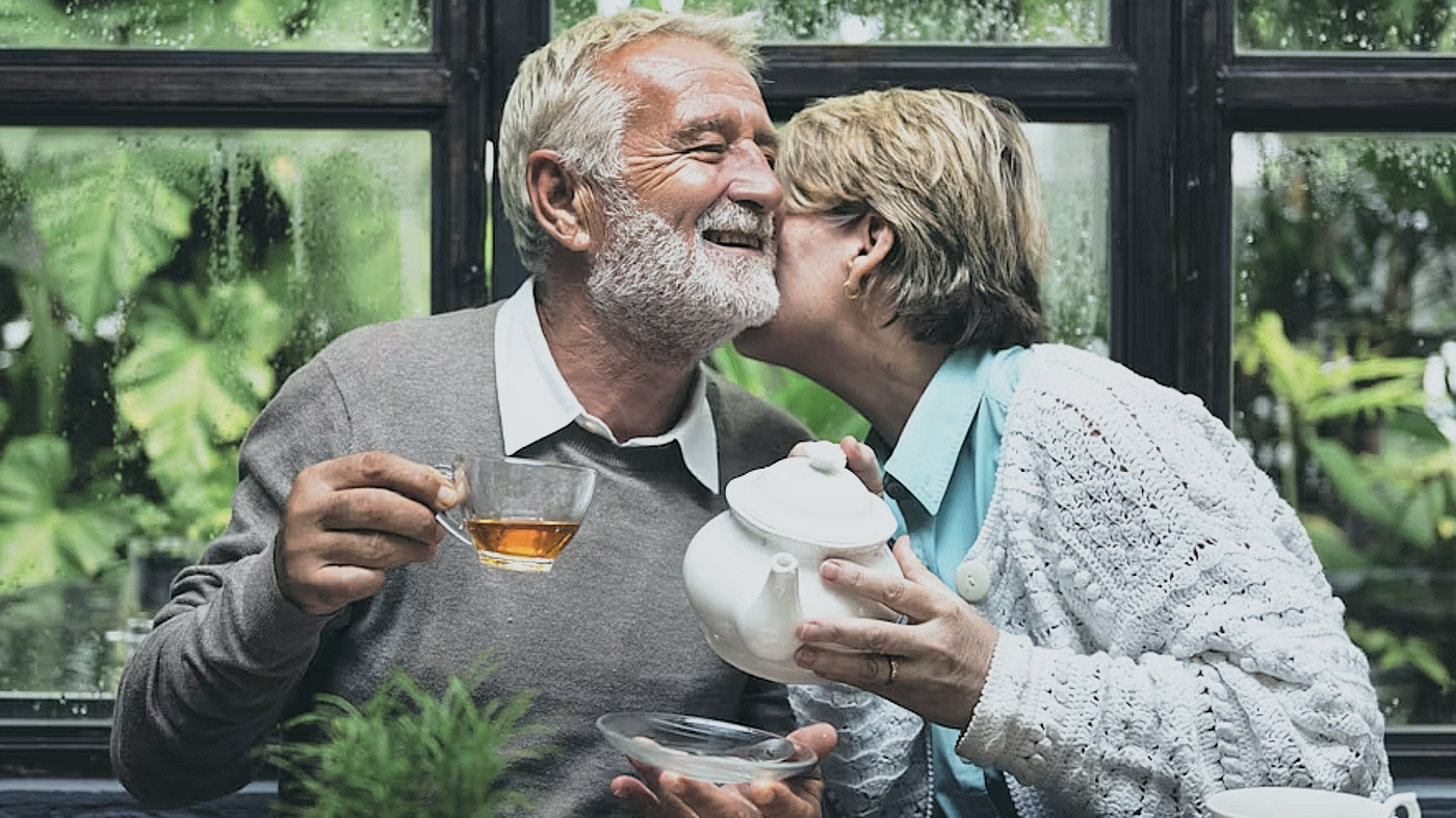 person holding silver fork and knife