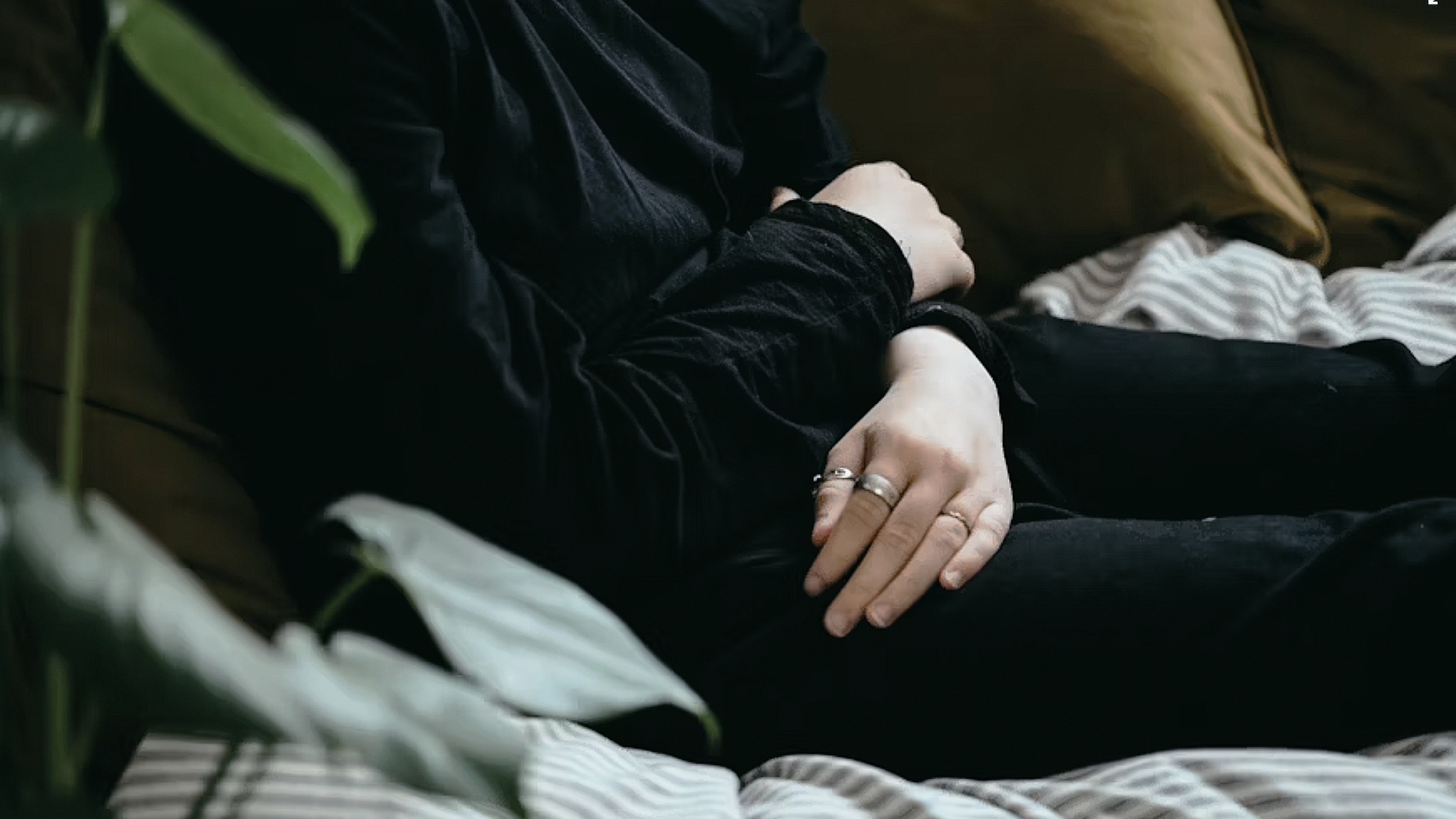 person holding silver fork and knife