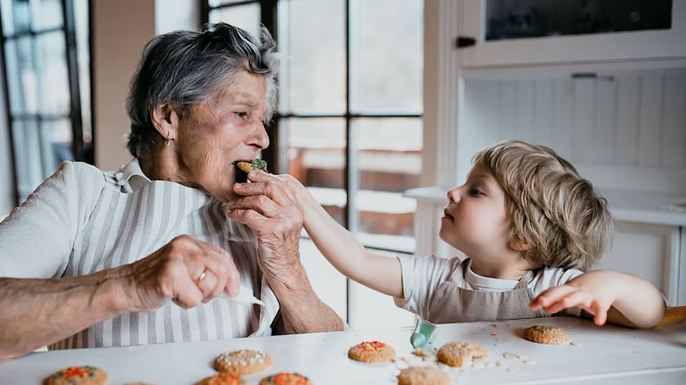 person holding silver fork and knife