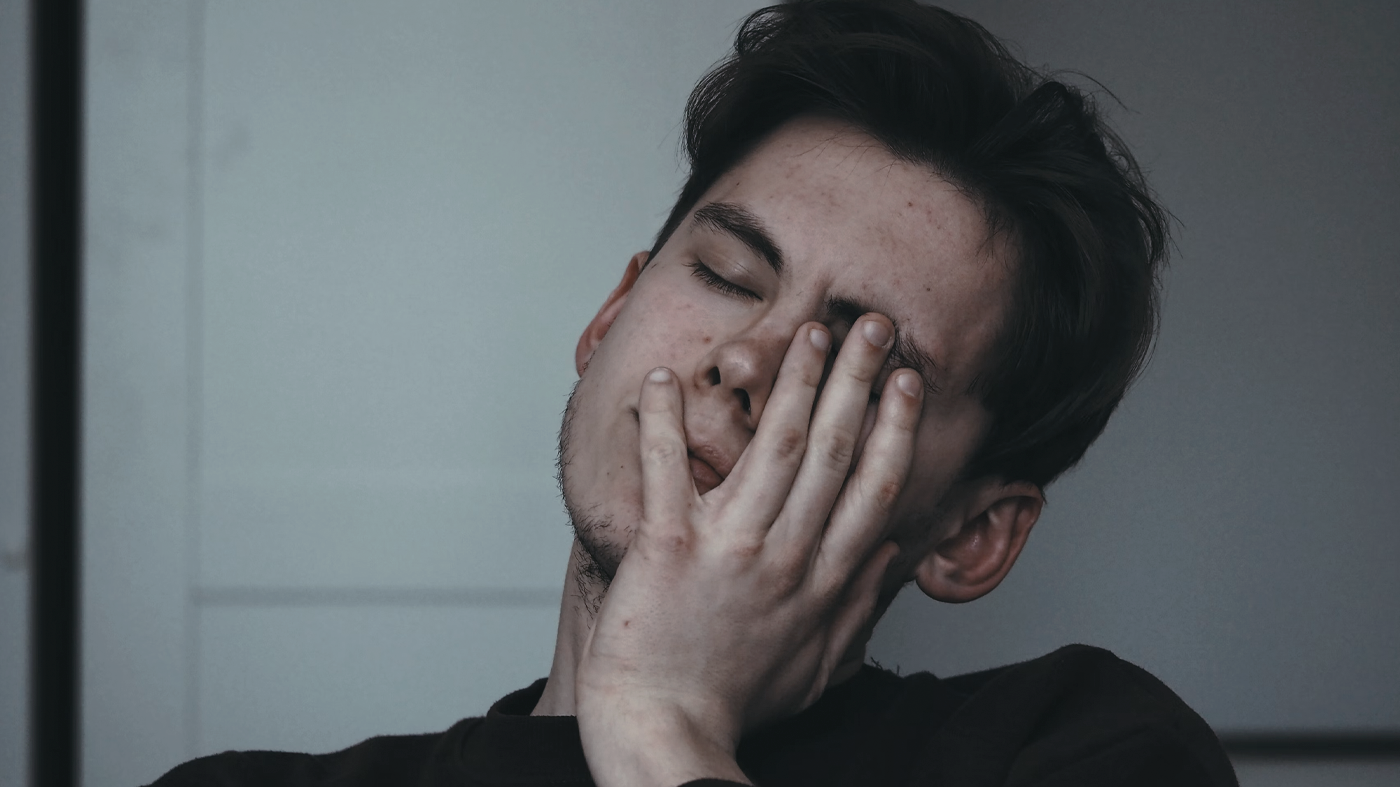 person holding silver fork and knife
